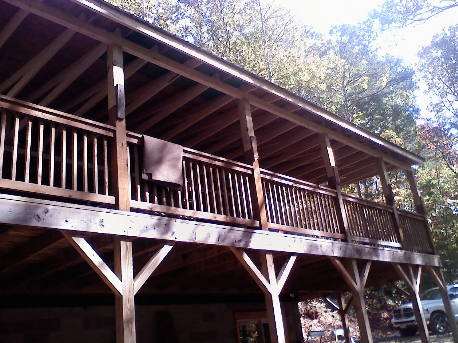 Timber framing under a new elevated porch and deck — Roof Leak Repair in Round Rock by Roofing Brothers